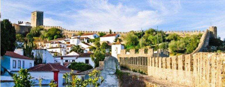Castillo de Óbidos y Villa de Navidad, alquiler de coches en Portugal 